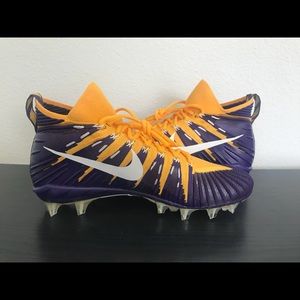 purple and yellow football cleats